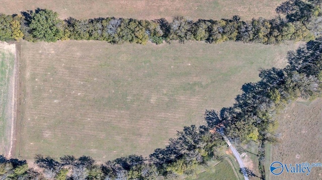 birds eye view of property with a rural view