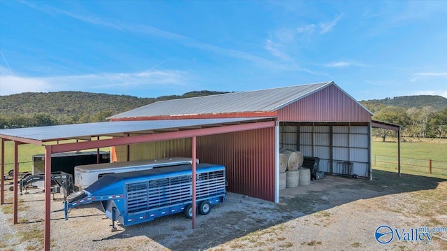 garage featuring a mountain view