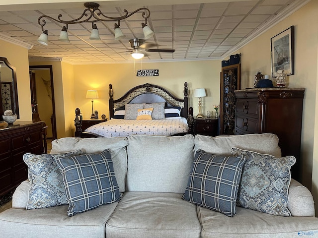 bedroom featuring ornamental molding and ceiling fan