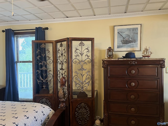 bedroom featuring crown molding