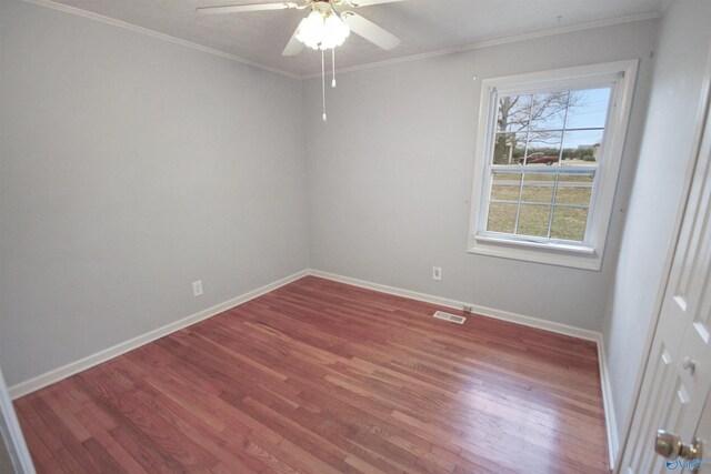 home office featuring light hardwood / wood-style floors, ceiling fan, and ornamental molding