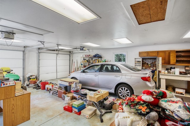 garage featuring a garage door opener