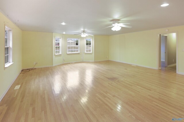 dining area featuring a textured ceiling, light hardwood / wood-style floors, and crown molding