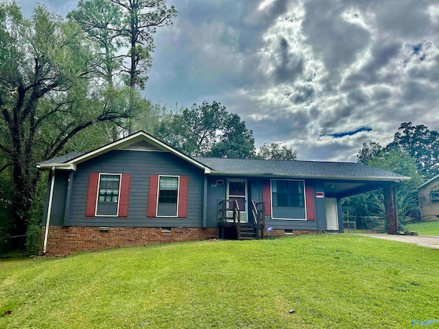 ranch-style house with a carport and a front yard