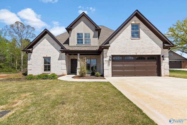 view of front of house featuring a garage and a front yard