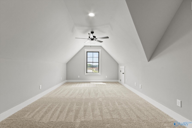 bonus room featuring carpet, lofted ceiling, and ceiling fan