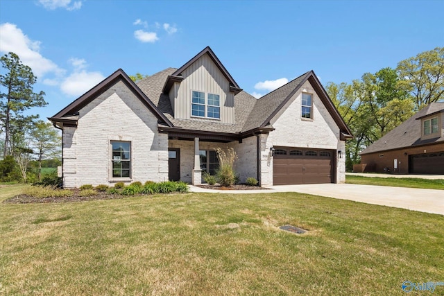 view of front of property featuring a garage and a front yard