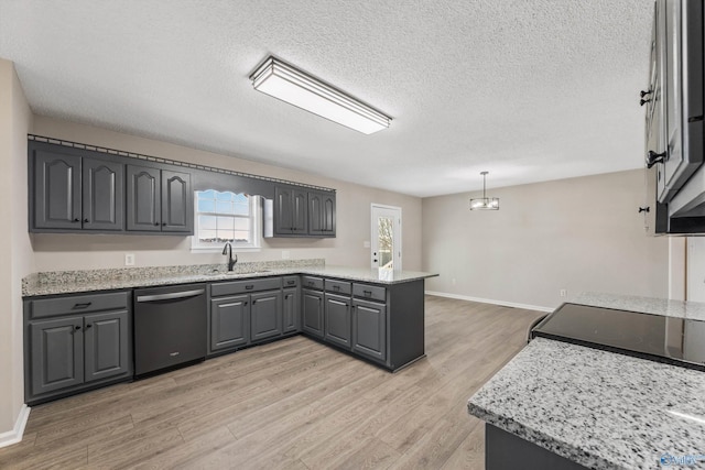 kitchen featuring light hardwood / wood-style floors, dishwasher, hanging light fixtures, gray cabinetry, and sink