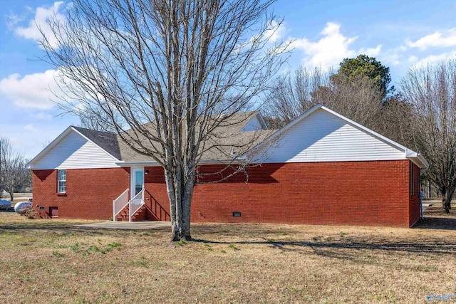 view of property exterior featuring a lawn