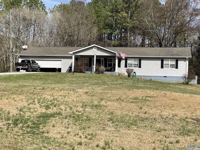 view of front of house featuring a garage, covered porch, and a front yard