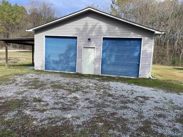 garage with a carport