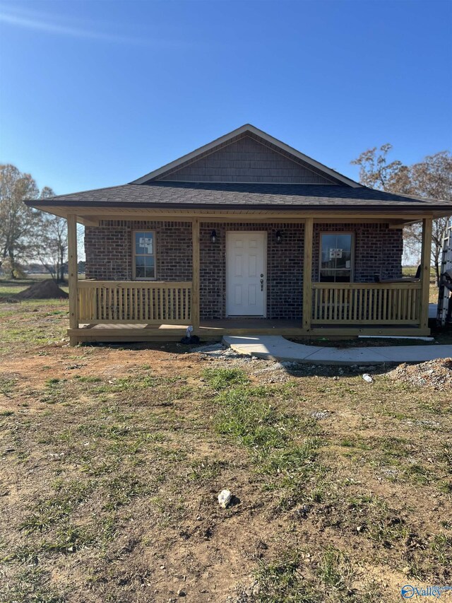 bungalow with a front yard