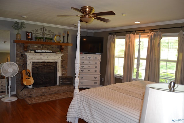 bedroom with hardwood / wood-style flooring, multiple windows, ceiling fan, and ornamental molding