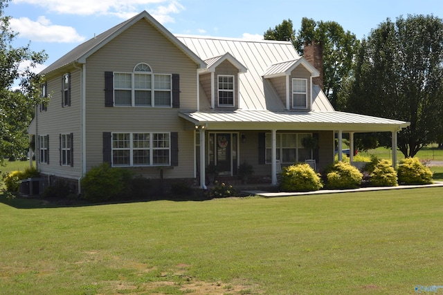 view of front facade featuring a front yard, central AC unit, and a porch