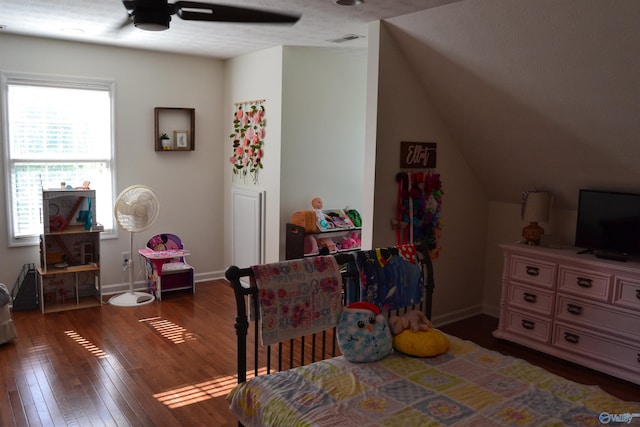 bedroom with ceiling fan and dark wood-type flooring