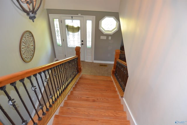 foyer entrance with light wood-type flooring