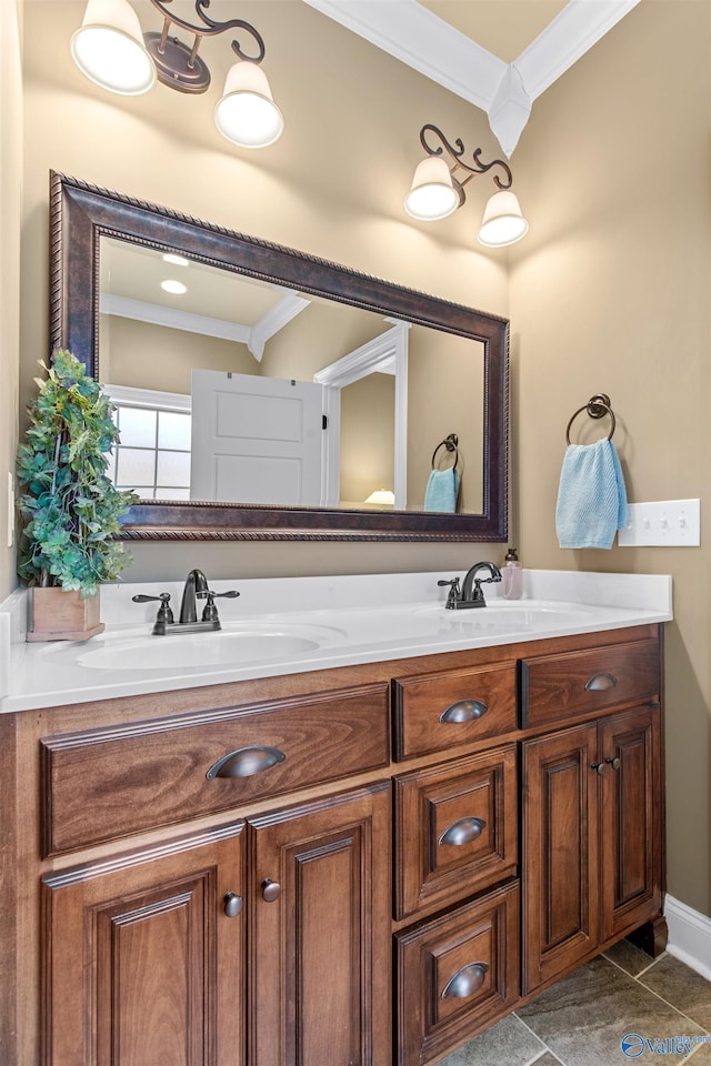 full bathroom featuring double vanity, tile patterned flooring, a sink, and crown molding