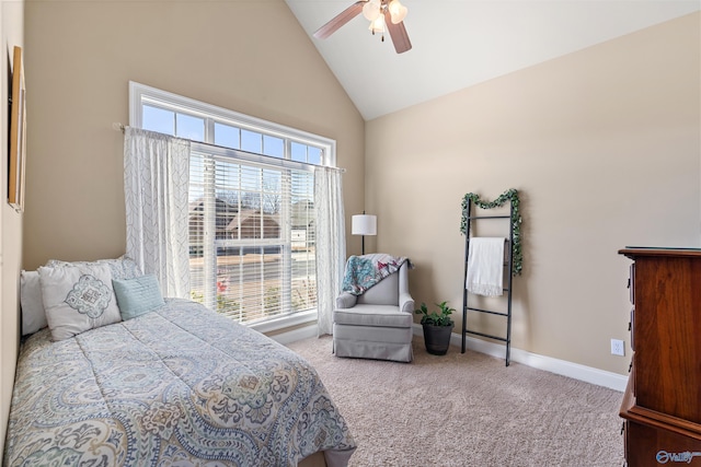 bedroom featuring carpet, baseboards, vaulted ceiling, and a ceiling fan