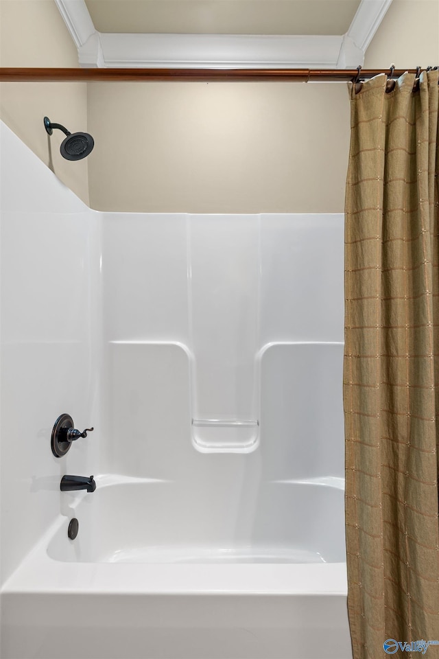 bathroom featuring shower / bath combo with shower curtain