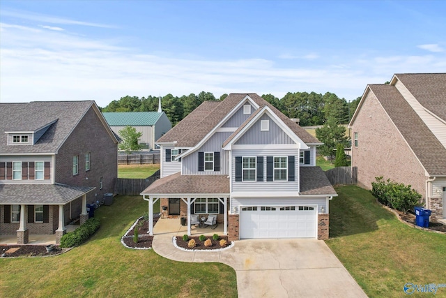 view of front facade featuring a porch, a garage, central air condition unit, and a front yard