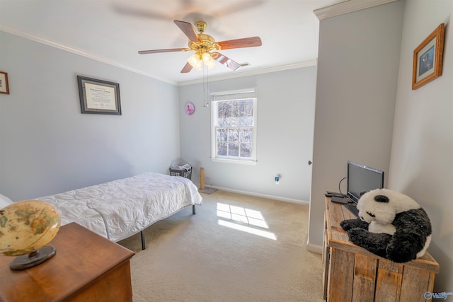 bedroom featuring a ceiling fan, baseboards, crown molding, and light colored carpet