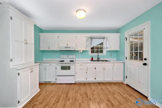 kitchen featuring sink, white cabinets, white range with electric stovetop, and light hardwood / wood-style flooring