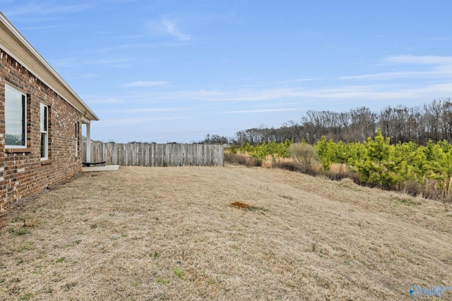 view of yard featuring fence