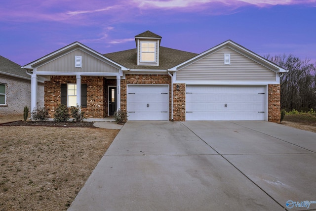 view of front facade with brick siding, a shingled roof, a porch, concrete driveway, and an attached garage