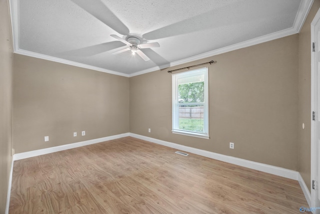 16712 Brooks Dr, Athens, AL 35611 - empty room featuring ceiling fan, light wood finished floors, baseboards, a textured ceiling, and ornamental molding