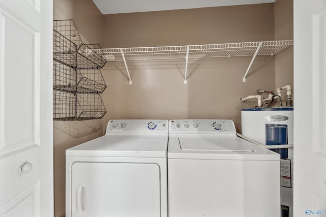16712 Brooks Dr, Athens, AL 35611 - laundry room with water heater and washing machine and dryer
