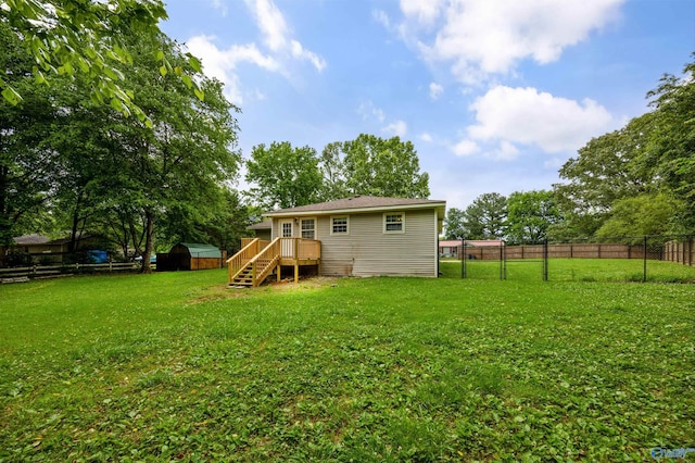 16712 Brooks Dr, Athens, AL 35611 - rear view of house with a wooden deck and stairway