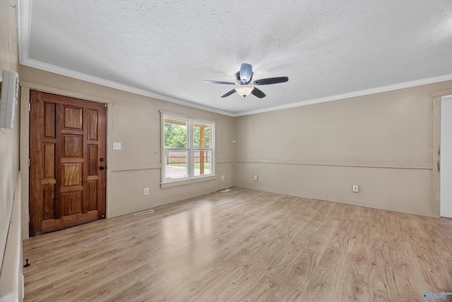 16712 Brooks Dr, Athens, AL 35611 - empty room featuring a textured ceiling, a ceiling fan, light wood-style flooring, and ornamental molding