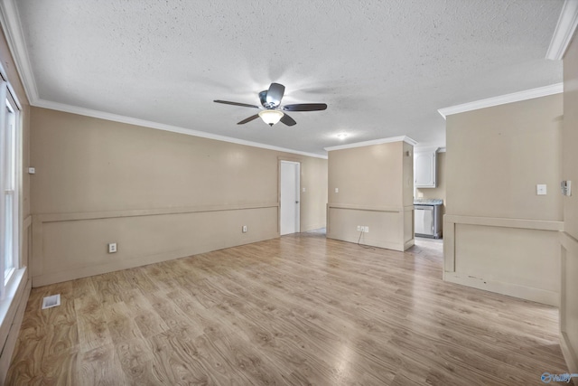 16712 Brooks Dr, Athens, AL 35611 - unfurnished living room featuring a ceiling fan, a textured ceiling, light wood-style floors, and ornamental molding