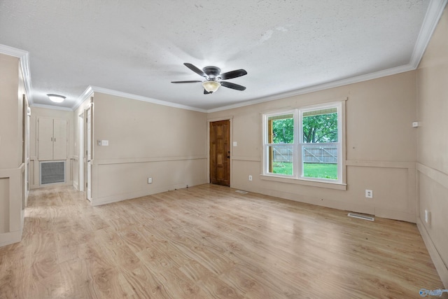 16712 Brooks Dr, Athens, AL 35611 - empty room with a textured ceiling, ornamental molding, light wood-type flooring, and ceiling fan