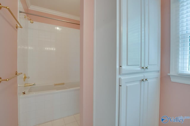bathroom with crown molding and shower / bath combination