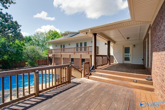 deck featuring a fenced backyard