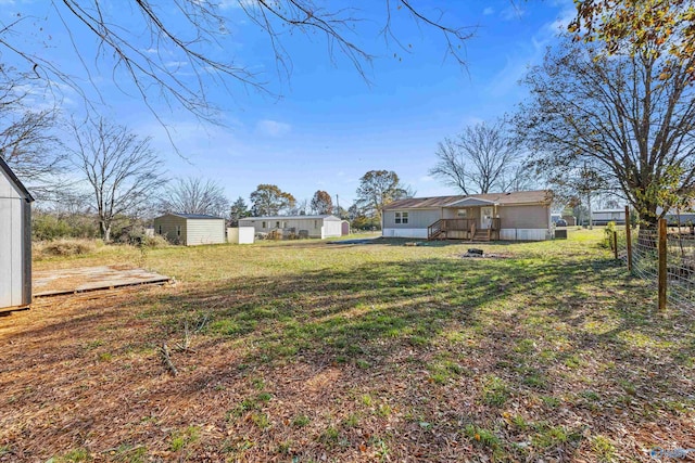 view of yard featuring a storage shed