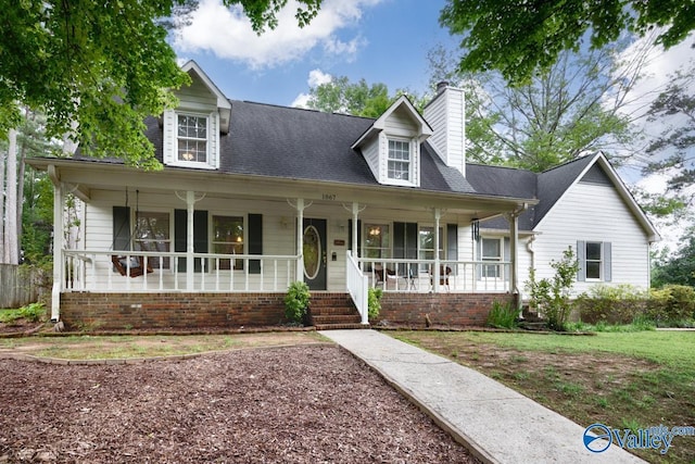 1867 Shellbrook Dr, Huntsville, AL 35806 - cape cod-style house with a porch and a chimney