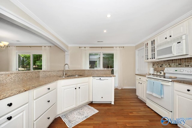 1867 Shellbrook Dr, Huntsville, AL 35806 - kitchen featuring white appliances, a sink, light wood-type flooring, backsplash, and glass insert cabinets