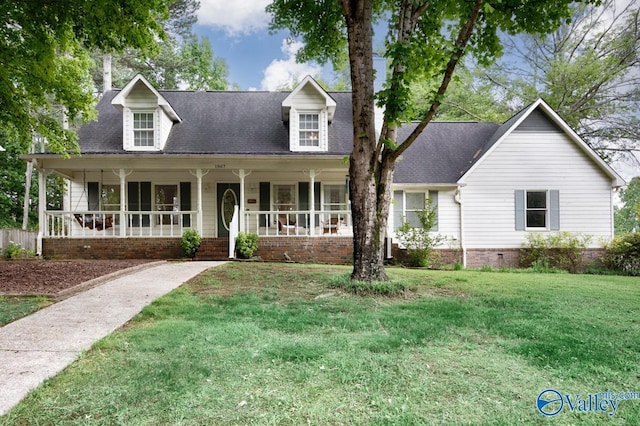 1867 Shellbrook Dr, Huntsville, AL 35806 - cape cod house with a front yard, covered porch, and a shingled roof