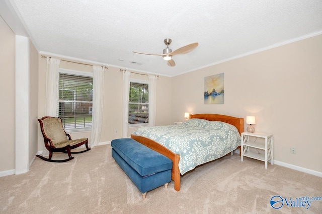 1867 Shellbrook Dr, Huntsville, AL 35806 - carpeted bedroom featuring a textured ceiling, baseboards, ornamental molding, and ceiling fan