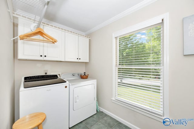 1867 Shellbrook Dr, Huntsville, AL 35806 - laundry area featuring washer and dryer, cabinet space, crown molding, baseboards, and light tile patterned floors