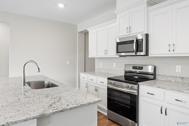 208 Hibiscus Dr, Hazel Green, AL 35750 - kitchen with a sink, white cabinetry, stainless steel appliances, and dark wood-type flooring
