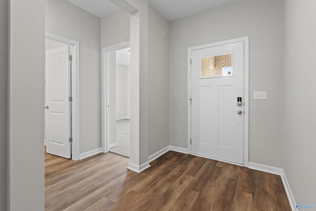 208 Hibiscus Dr, Hazel Green, AL 35750 - entryway with dark wood-type flooring and baseboards