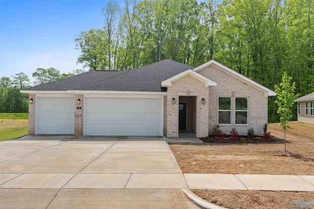 208 Hibiscus Dr, Hazel Green, AL 35750 - single story home with a garage, brick siding, and concrete driveway