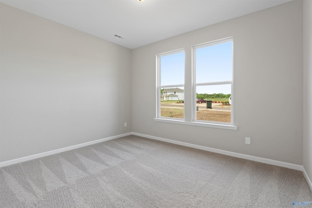 208 Hibiscus Dr, Hazel Green, AL 35750 - carpeted empty room featuring baseboards and visible vents