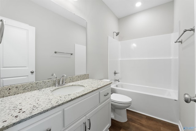 208 Hibiscus Dr, Hazel Green, AL 35750 - full bath with wood finished floors, toilet, shower / bath combination, and vanity