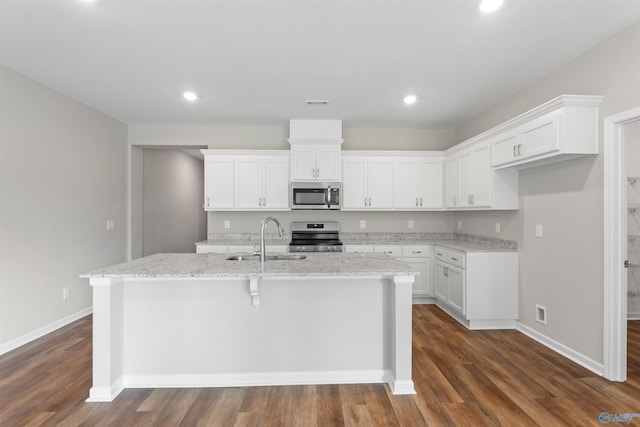 208 Hibiscus Dr, Hazel Green, AL 35750 - kitchen with appliances with stainless steel finishes, a center island with sink, white cabinets, and a sink