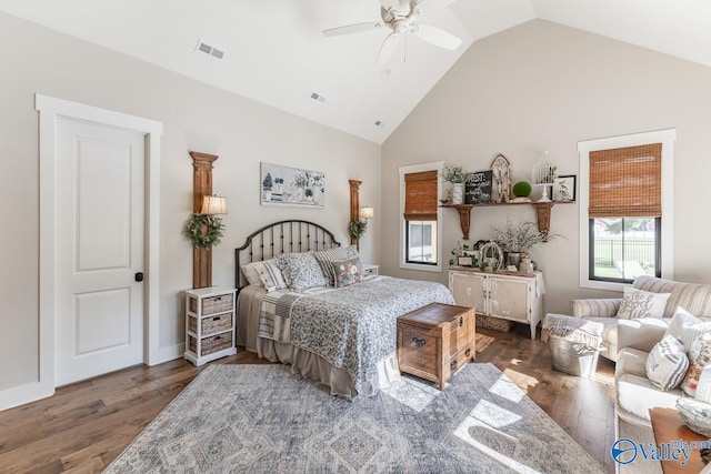 bedroom featuring high vaulted ceiling, dark wood-type flooring, and ceiling fan