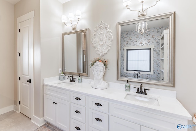 bathroom with double vanity and tile patterned floors